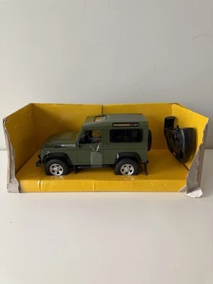 1/14 Rastar Land Rover RC Car Defender Green Heavy Metal Diecast - Image 1 of 4