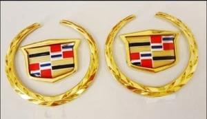 CADILLAC STS GOLD WREATH AND CREST EMBLEM PAIR - Bild 1 von 1