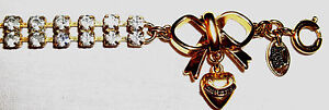 NWOB Juicy Couture Light Blue Crystal & Gold bracelet with bow & heart charm