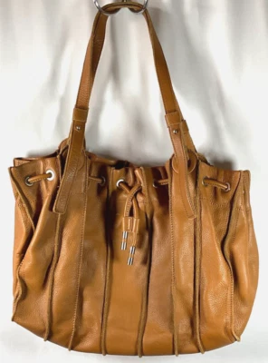 Kenneth Cole New York large hobo shoulder bag brown leather drawstring mag close - Image 1 of 4