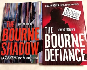 Robert Ludlum Bourne Shadow & Bourne Defiance Brian Freeman Signed 1st HC DJ - Foto 1 di 11