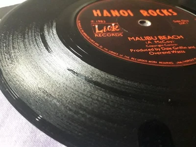 Hanoi Rocks- Malibu Beach  7" Single. VG+ condition. (LIX1) - Image 1 of 4