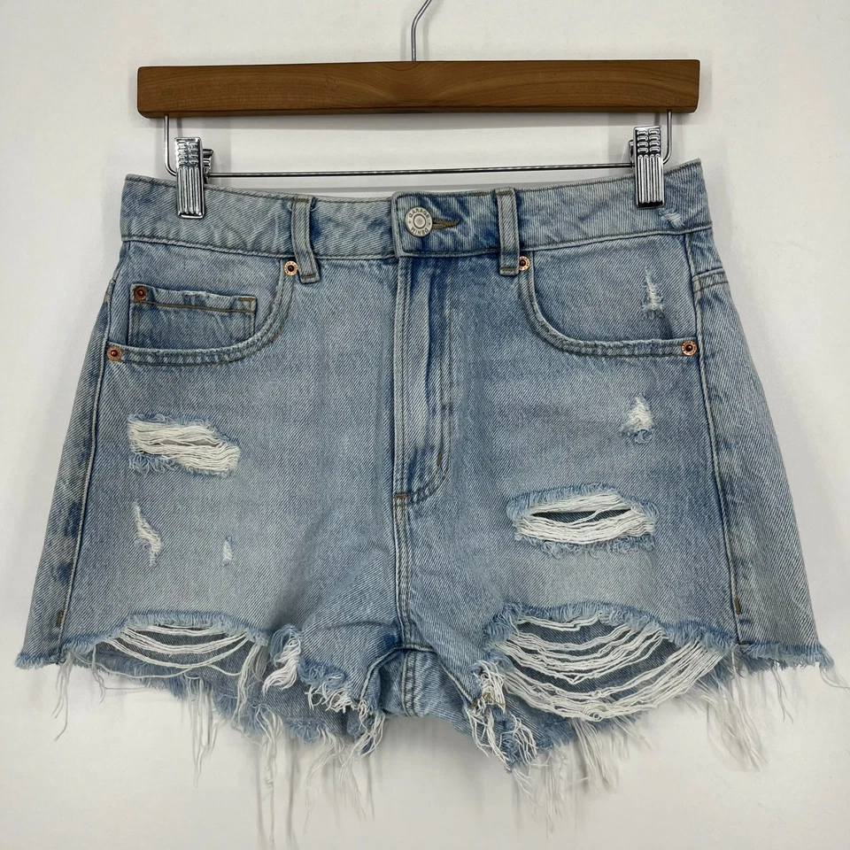 Pantalones cortos de mezclilla Garage para mujer talla 26 azul corte festival desgastado lavado claro Foto 1 de 4