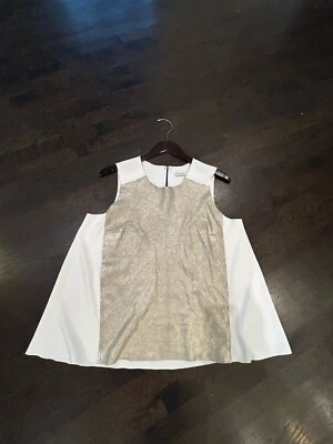 Camiseta sin mangas TRINA TURK para mujer fluida metálica dorada de cuero mixta talla L usada en excelente estado Foto 1 de 4