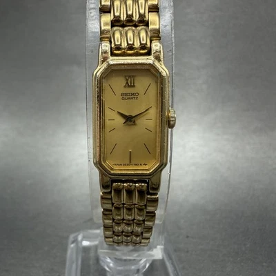 Seiko tank Watch Women 12mm Champagne Dial Gold Tone 2e20-6389 New Battery - Image 1 of 4