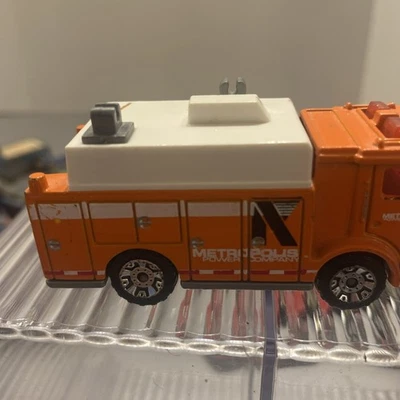 Camión eléctrico auxiliar Matchbox 1991 Mack naranja/puente y autopista A12 Foto 1 de 4