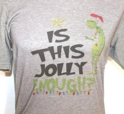 CAMISETA GRINCH "IS THIS JOLLY OUGH" TALLA PEQUEÑA GRIS NEXT LEVEL ROPA S/S Foto 1 de 4