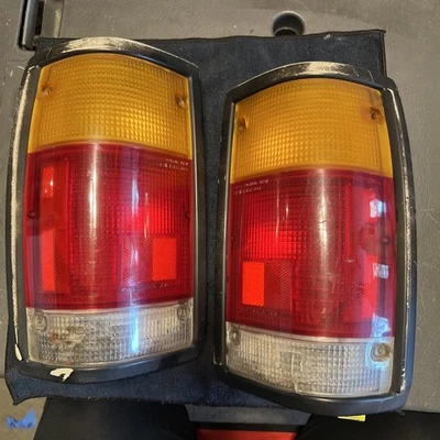 1986-1993 Mazda B2200 Right and Left Taillight Assembly Black Trim Moulding OEM - Image 1 of 4