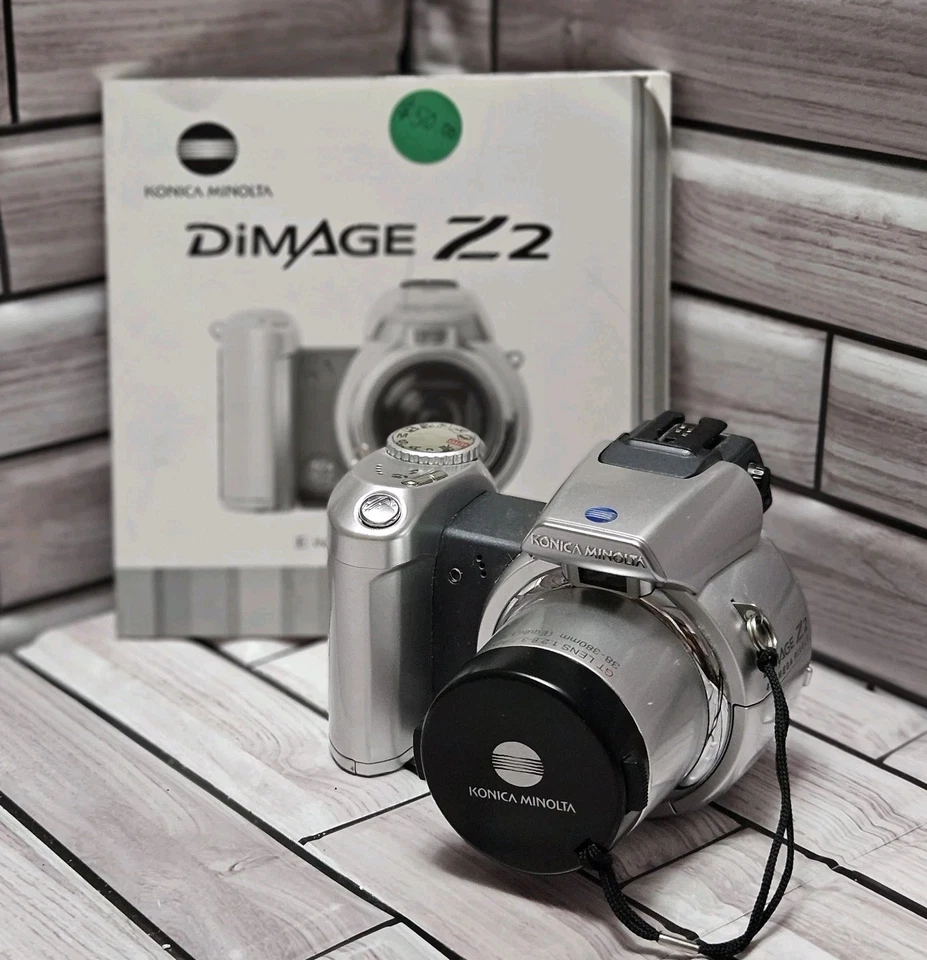 Cámara digital Konica Minolta Dimage Z2 4 MP 10X zoom + libro para piezas o reparaciones Foto 1 de 4