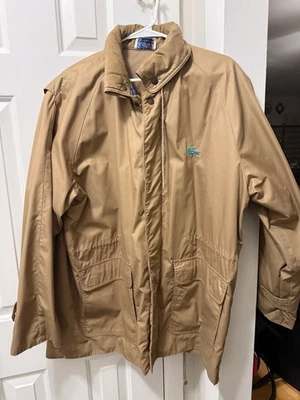 VINTAGE Izod Lacoste Jacket Mens Large Tan Nylon Windbreaker Hidden Hood 90s 80’ - Image 1 of 4
