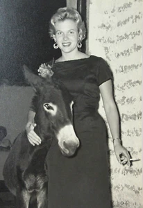 Strange Photo Pretty Woman Hugging Burro Donkey Dress Corsage Cigarette 1950s - Picture 1 of 7