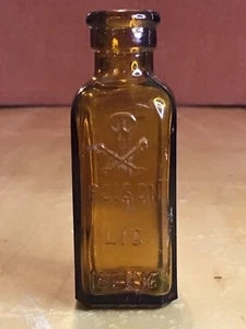 Vintage golden amber brown skull and crossbones poison bottle - Picture 1 of 8