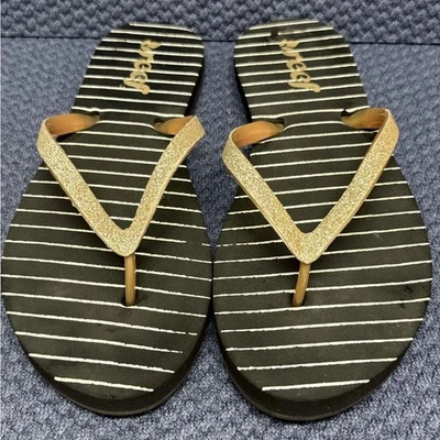 Sandalias para mujer Reef doradas y negras brillantes. Talla 7. Foto 1 de 4
