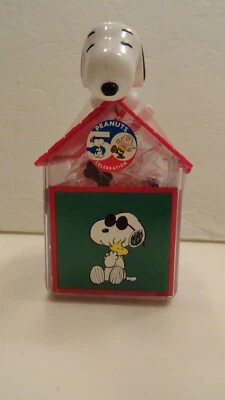 NEW Peanuts 50 Year Celebration Snoopy on dog house Candy Bonz candy container - Image 1 of 4