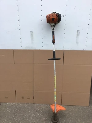 Recortadora Stihl FS100 RX7 31,4 cc motor de 4 mezclas funciona pero el gatillo está atascado como está Foto 1 de 4