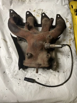 1990-1994 Mitsubishi Eclipse 1.8L engine exhaust manifold metal W1 - Image 1 of 4