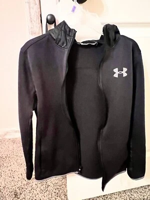 Chaqueta Under Armour negra juvenil talla mediana Foto 1 de 2