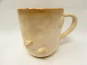 Seaside Tan by Sonoma Home Tan Rim, White Center, Embossed Shells Mug B189 - Picture 1 of 3