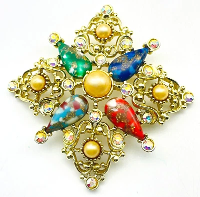 Prendedor estrella de cuatro puntas Sarah Coventry tono dorado pedrería perla simulada Foto 1 de 4