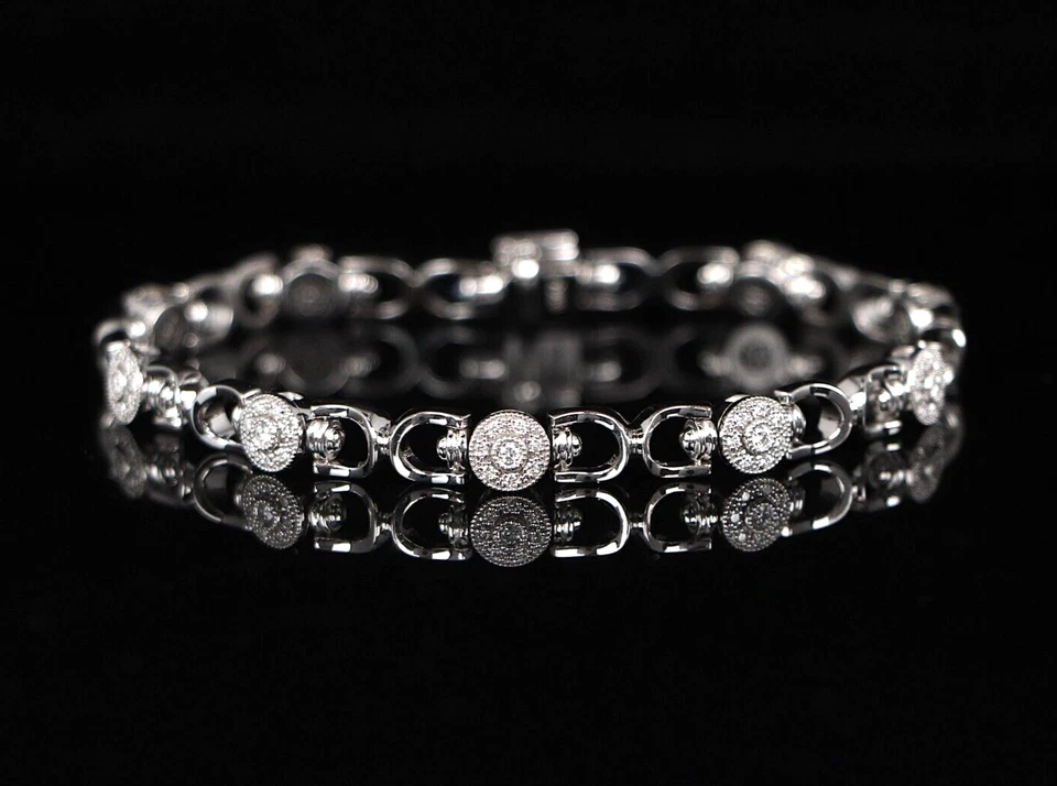 Brazalete de eslabones Charriol de 7"" de oro blanco de 18 quilates con milgrain de diamantes redondos de 1,20 quilates de $8.500 Foto 1 de 1