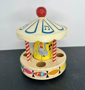 Carrusel de juguete de madera vintage 1963 Fisher Price musical Merry Go Round gira - Imagen 1 de 10