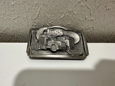 Hebilla de cinturón de semirremolques Peterbilt vintage, estaño, 1987 Tonkin Inc. Foto 1 de 4