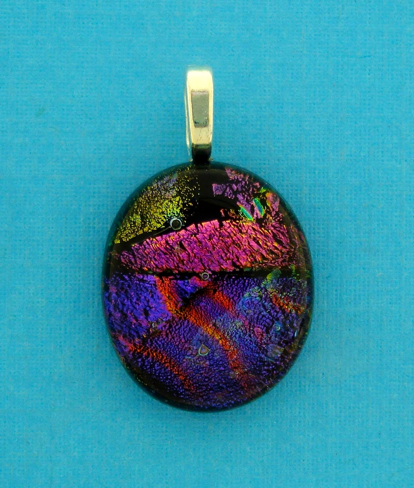 VIDRIO DICROICO OVALADO, MORADO OSCURO, ORO N ROSA, FIANZA PLATEADA Foto 1 de 1