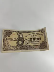 Raro billete de 10 Sepoeloeh Roepiah 10 SL Dai Nippon Teikoku japonés Indonesia - Imagen 1 de 2