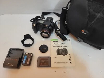 Canon PowerShot Pro1 8MP Camera. 7x Optical Zoom. Canon L Zoom Lens Accessories - Image 1 of 4