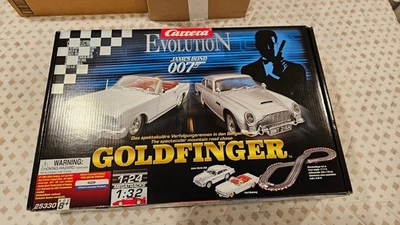 Juego de coche de carreras Carrera Evolution Goldfinger eléctrico nuevo en caja Foto 1 de 4