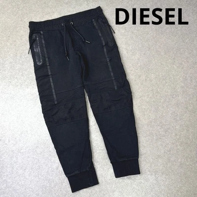 Pantalones de chándal DIESEL en negro con dobladillo acanalado, RT Foto 1 de 4