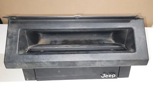 Guantera de bloqueo gris oscuro Jeep Wrangler YJ 1987-1995 buena usada OEM - Imagen 1 de 11