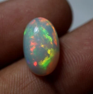 4.9 Ct 15.4x9.6 MM Real AAA Grade Flashy Multi Fire Ethiopian Opal Oval Cabochon - Picture 1 of 16