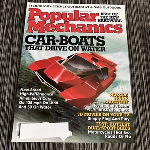 Popular Mechanics • January 2004 • Car-Boats That Drive On Water - Foto 1 di 2