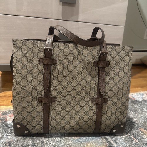 Gucci Borsa da viaggio con fibbia GG rivestita in tela con pelle media