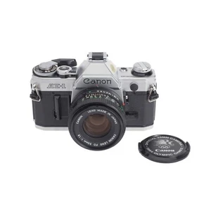 NM Canon AE-1 35mm Film Manual Focus SLR Camera Silver with 50mm F1.8 Lens - Picture 1 of 12