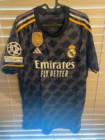 Real Madrid 2023/2024 Away Soccer Jersey gold blue UCL W custom name Cover