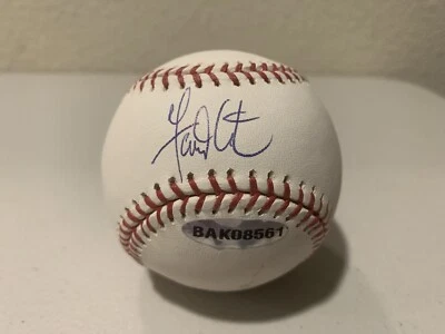 Cubierta superior de béisbol firmada por Garrett Atkins Foto 1 de 4