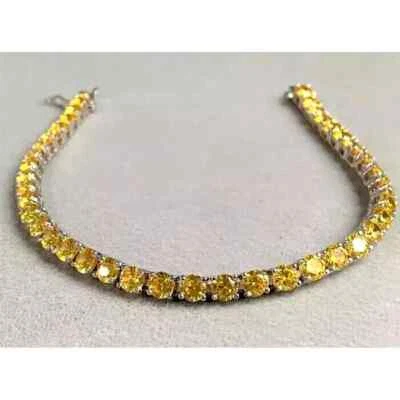 Brazalete tenis zafiro amarillo creado en laboratorio de corte redondo de 8 quilates enchapado en oro blanco de 14 quilates Foto 1 de 2