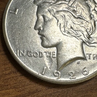 1926 $1 Peace Silver Dollar AU Details - cleaned ERROR Struck Through Obverse - Image 1 of 4