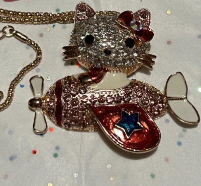 Collar/alfiler avión gato gatito tono dorado con cristales rosas Foto 1 de 4