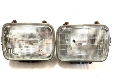 Cucharones de faros Jeep YJ Wrangler con retenedor Chome / ajustador de bombillas 87-95 Foto 1 de 4