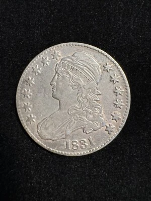 Medio dólar busto tapado XF 1831 limpio Foto 1 de 2