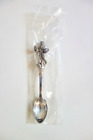 Brand NEW Reed and Barton silver plated Spoon "Santas of the World" Christmas