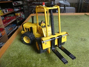 Blechspielzeug Tonka Forklift , Gabelstapler mit Hebefunktion und Fahrer - Bild 1 von 8