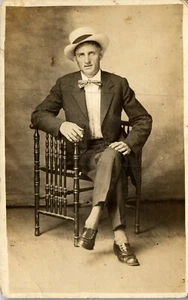 Vintage Photo RPPC Postcard Man in hat & Bow Tie with Ornate Chair Dayhoit KY - Picture 1 of 4