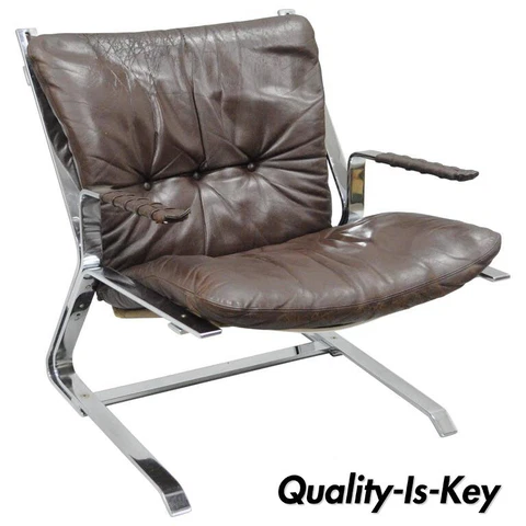 Pirate Lounge Chair Brown Leather & Chrome by Elsa & Nordahl Solheim for Rykkin Cover
