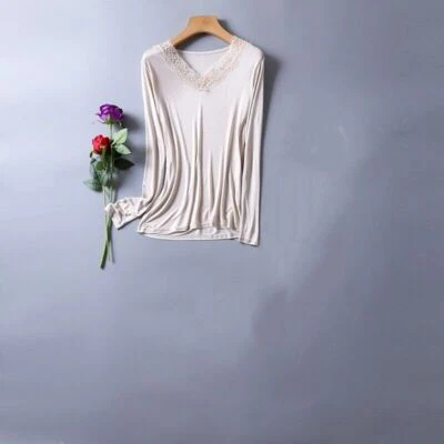 Camiseta tejida 100 % seda morera delgada cálida de seda con cuello en V para mujer Foto 1 de 4