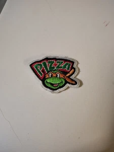Parche de pizza Teenage Mutant Ninja Turtles Miguel Ángel nostálgico años 80 dibujos animados embr - Imagen 1 de 2