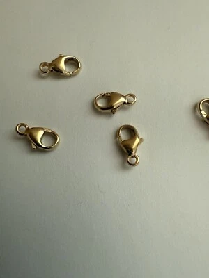 Cierre de langosta ovalado relleno de oro 14kt 9x5mm 10 piezas Foto 1 de 4